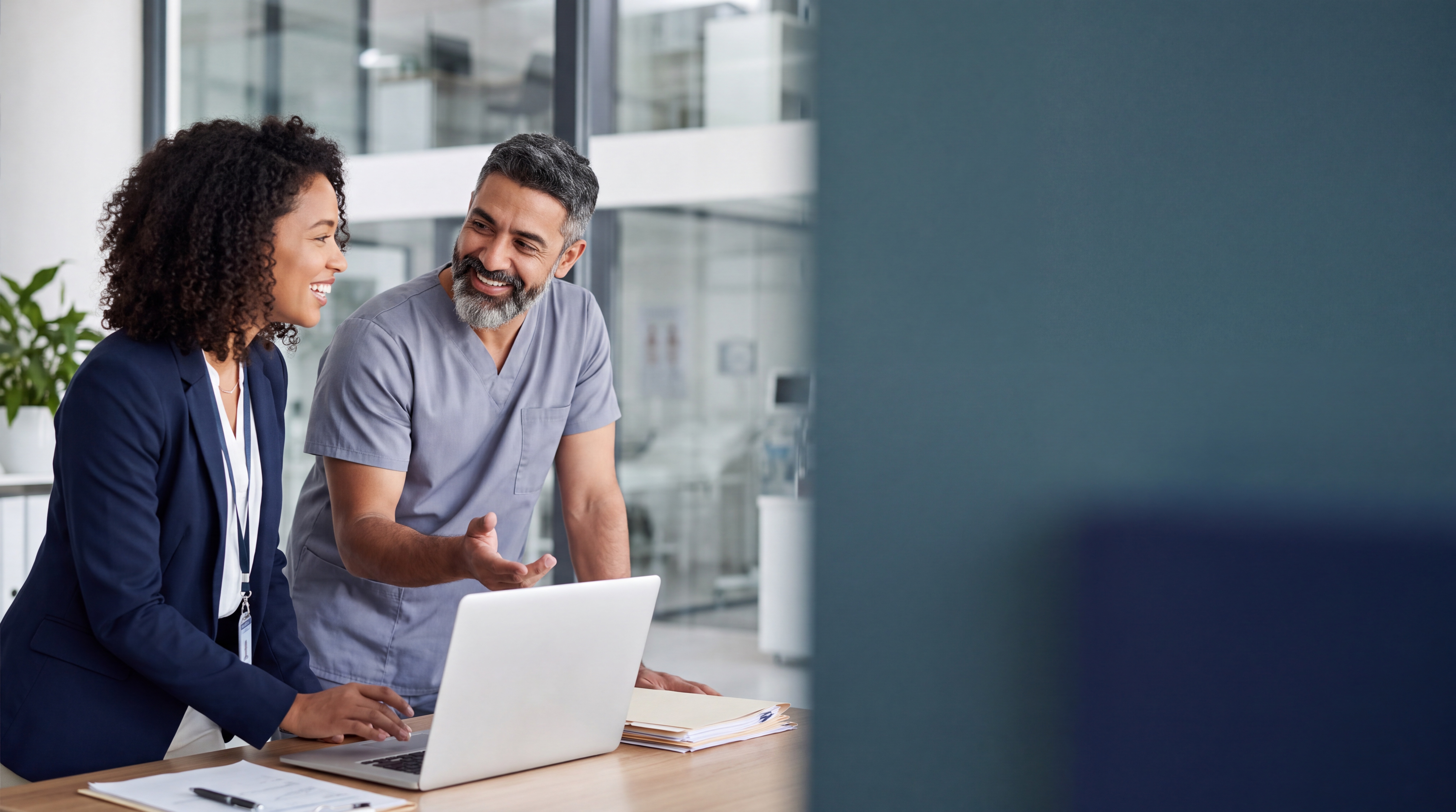 Healthcare professionals collaborating around a clinical workflow